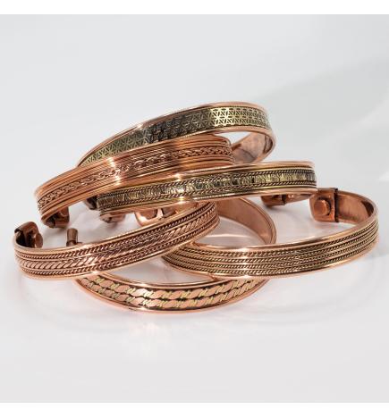 Pulseras con diseño de bandas de cobre e imanes (surtidas)
